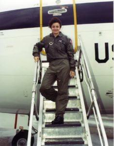 Graciela Tiscareńo Sato climbing into the plain she served with for many years